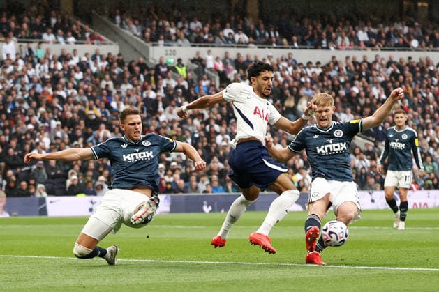 London, England, 29th August 2026. Omar Marmoush of Tottenham Hotspur with Lewis Hall of Newcastle United during the Tottenham Hotspur vs Newcastle United Premier League match at the Tottenham Hotspur Stadium, London. Picture credit should read: David Klein Sportimage EDITORIAL USE ONLY. No use with unauthorised audio, video, data, fixture lists, club league logos or live services. Online in-match use limited to 120 images, no video emulation. No use in betting, games or single club league player publications. SPI_003_DK_Spurs_Newcastle SPI-4941-0003