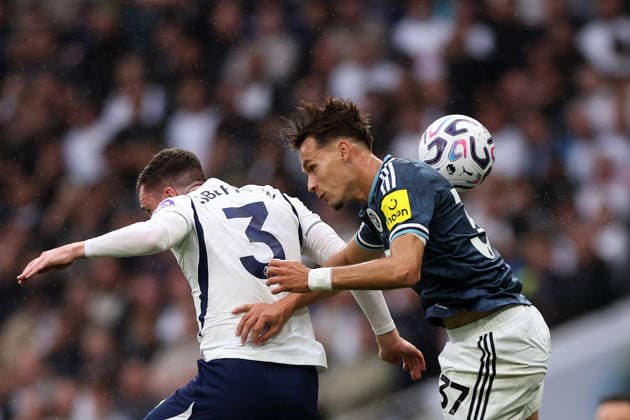 London, England, 29th August 2026. Andy Robertson of Tottenham Hotspur with Amar Dedic of Newcastle United during the Tottenham Hotspur vs Newcastle United Premier League match at the Tottenham Hotspur Stadium, London. Picture credit should read: David Klein Sportimage EDITORIAL USE ONLY. No use with unauthorised audio, video, data, fixture lists, club league logos or live services. Online in-match use limited to 120 images, no video emulation. No use in betting, games or single club league player publications. SPI_009_DK_Spurs_Newcastle SPI-4941-0009