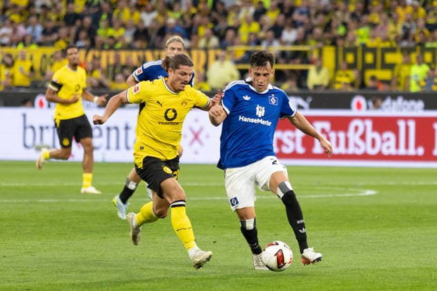 Dortmund, Deutschland 29. August 2026: 1. BL - 2026 2027 - Sp. 1 - Borussia Dortmund gegen Hamburger SV Im Bild: v. li. im Zweikampf Marcel Sabitzer (BVB), Nicolas Capaldo (HSV) DFL DFB regulations prohibit any use of photographs as image sequences and or quasi-video. Signal Iduna Park Nordrhein Westfalen *** Dortmund, Germany, August 29, 2026, Bundesliga 1, 2026–2027 Season, Matchday 1: Borussia Dortmund vs. Hamburger SV. Pictured, from left, in a tackle: Marcel Sabitzer (BVB), Nicolas Capaldo (HSV). DFL and DFB regulations prohibit any use of photographs as image sequences and or quasi-video. Signal Iduna Park, North Rhine-Westphalia Copyright: xFotostandx xZeisingx