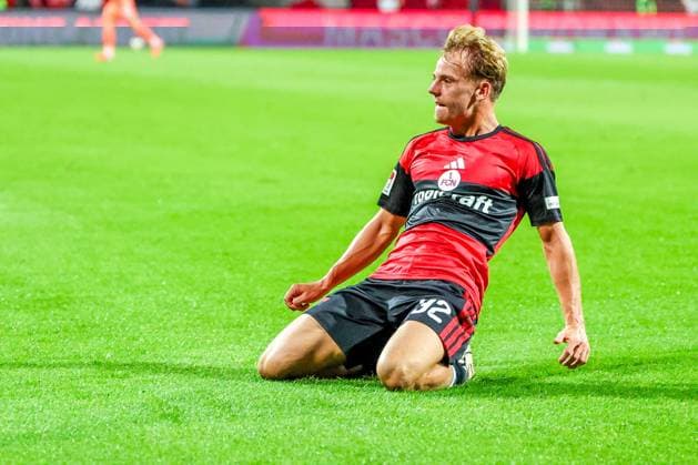 Tim Janisch 32 (1FC Nuernberg) jubelt nach seinem Tor zum 2:0, Freude, Emption, Jubel, 1. FC Nuernberg vs. DSC Arminia Bielefeld, Fussball, Maenner, 2. Bundesliga, Saison 2026 2027, Hinrunde, 3. Spieltag, 29.08.2026 DFB regulations prohibit any use of photographs as image sequences and or quasi-video Nuernberg Bayern Deutschland *** Tim Janisch, 32, of 1. FC Nuremberg celebrates after scoring the goal to make it 2–0—joy, emotion, celebration—1. FC Nuremberg vs. DSC Arminia Bielefeld, soccer, men s, 2. Bundesliga, 2026–2027 season, First half of the season, Matchday 3, August 29, 2026. DFB regulations prohibit any use of photographs as image sequences and or quasi-video. Nuremberg, Bavaria, Germany Copyright: xkolbert-press MartinxAgüerax