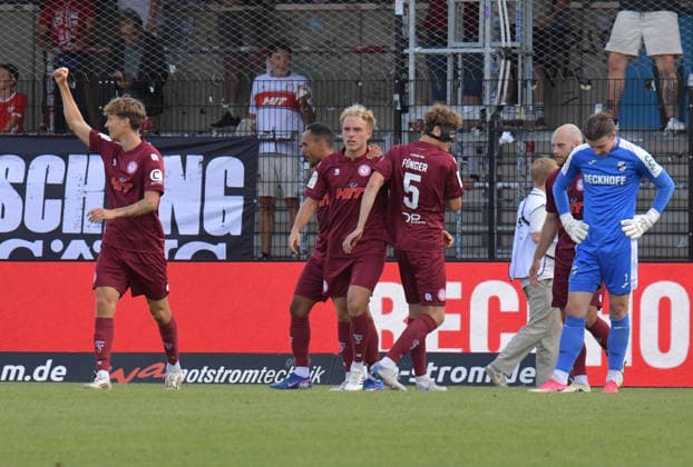 August 29, 2026, Germany, Soccer, 3rd Division, 2026–2027 Season, Matchday 3, Sportclub Arena, Verl SC Verl vs. Fortuna Köln 1–2 Goal celebration: Fortuna Köln players gather around goal scorer Timo Bornemann (Fortuna Köln, center), action, single frame, landscape orientation, facial expressions, gestures, celebration, cheering, joy, happiness