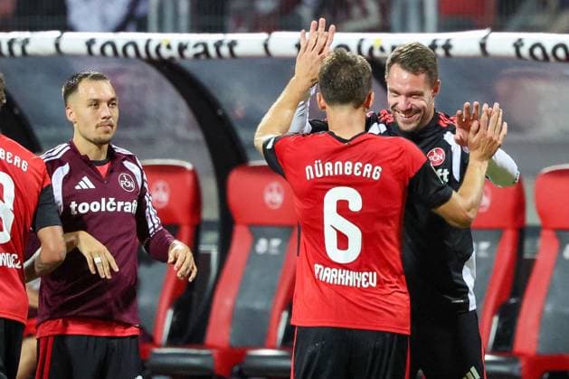 Adam Markhiyev 6 (1FC Nuernberg) jubelt mit Christian Mathenia 26 (1FC Nuernberg) ueber das Tor zum 4:0, 1. FC Nuernberg vs. DSC Arminia Bielefeld, Fussball, Maenner, 2. Bundesliga, Saison 2026 2027, Hinrunde, 3. Spieltag, 29.08.2026 DFB regulations prohibit any use of photographs as image sequences and or quasi-video Nuernberg Bayern Deutschland *** Adam Markhiyev 6, 1. FC Nuremberg, celebrates with Christian Mathenia 26, 1. FC Nuremberg, after scoring the goal that made it 4–0, 1 FC Nuremberg vs. DSC Arminia Bielefeld, Soccer, Men, 2. Bundesliga, 2026–2027 season, First Half of the Season, Matchday 3, August 29, 2026. DFB regulations prohibit any use of photographs as image sequences and or quasi-video. Nuremberg, Bavaria, Germany Copyright: xkolbert-press MartinxAgüerax