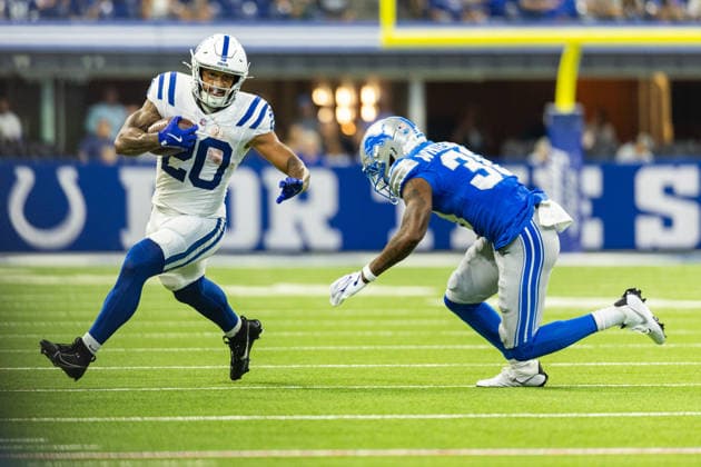 Aug 29, 2026; Indianapolis, Indiana, USA; Indianapolis Colts running back Seth McGowan (20) runs with the ball as Detroit Lions defensive back Nick Whiteside (38) pursues during NFL, American Football Herren, USA preseason game action at Lucas Oil Stadium. Mandatory Credit: -Cal Media NFL 2026: Lions Vs Colts AUG 29  - ZUMAc04_ 20260829_zma_c04_004 Copyright: xJohnxMersitsx