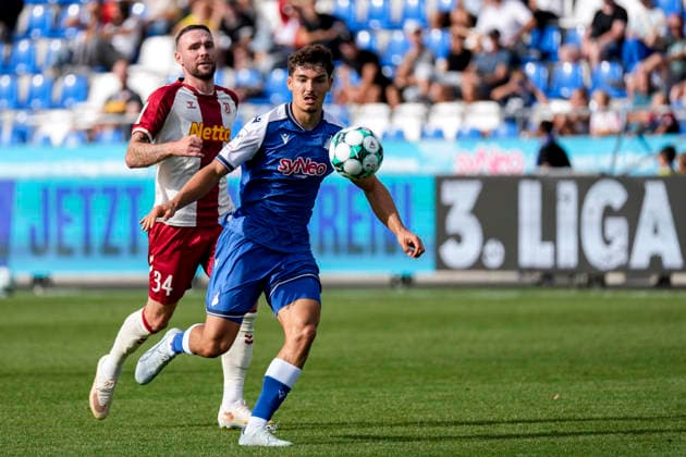 From left: Patrick Hobsch (Regensburg), 34; Sean Dulic (TSG II), 3; tackle, game scene, duel, tackle, tackling, dynamism, action, 08 29 2026, Sinsheim, Germany, soccer, 3rd Division, TSG 1899 Hoffenheim II vs. SSV Jahn Regensburg, DFB and DFL regulations prohibit any use of photographs as image sequences and or quasi-video xozx