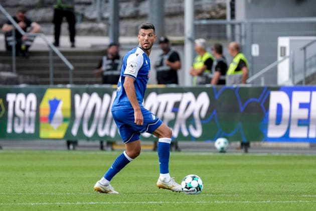 Klaus Gjasula TSG II, 5, on the ball, isolated figure, full-body shot, single frame, single photo, action, 29 Aug 2026, Sinsheim, Germany, soccer, 3rd Division, TSG 1899 Hoffenheim II vs. SSV Jahn Regensburg, DFB and DFL regulations prohibit any use of photographs as image sequences and or quasi-video xozx