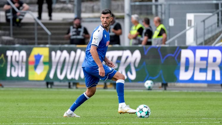 Klaus Gjasula TSG II, 5, on the ball, isolated figure, full-body shot, single frame, single photo, action, 29 Aug 2026, Sinsheim, Germany, soccer, 3rd Division, TSG 1899 Hoffenheim II vs. SSV Jahn Regensburg, DFB and DFL regulations prohibit any use of photographs as image sequences and or quasi-video xozx