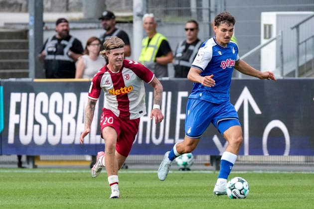 From left: John Posselt (Regensburg), 20; Sean Dulic (TSG II), 3; tackle, game scene, duel, tackle, tackling, dynamics, action, 08 29 2026, Sinsheim, Germany, soccer, 3rd Division, TSG 1899 Hoffenheim II vs. SSV Jahn Regensburg, DFB and DFL regulations prohibit any use of photographs as image sequences and or quasi-video xozx
