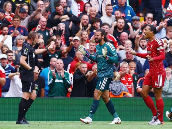Liverpool goalkeeper Alisson Becker and Virgil van Dijk react towards referee Sam Barrott Liverpool v Nottingham Forest, Premier League Football, Football, Anfield, Liverpool, UK - 29 Aug 2026Liverpool Anfield United Kingdom EDITORIAL USE ONLY No use with unauthorised audio, video, data, fixture lists, club league logos or live services. Online in-match use limited to 120 images, no video emulation. No use in betting, games or single club league player publications.  Copyright: xMattxWest Shutterstockx 17118964cq