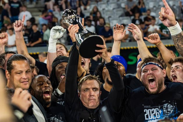 Nordic Storm players, Head Coach John Shoop, and EFA President Markus Kuhn celebrate with the championship trophy. 29.08.2026, Innsbruck, European Football Alliance, Championship Game, Munich Ravens - Nordic Storm. Innsbruck Tivoli Stadium Austria Copyright: xPFA RicoxDoninellix