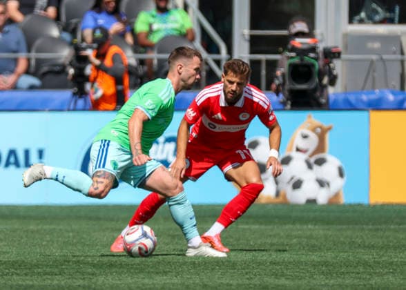 SEATTLE, WA - AUGUST 29: (left to right) Seattle Sounders FC midfielder Albert Rusnak (11) keeps the ball away from Chicago Fire FC forward Philip Zinckernagel (11) in the first half during the MLS, Fussball Herren, USA match between Chicago Fire FC and Seattle Sounders FC on August 29, 2026 at Lumen Field in Seattle, Washington. (Photo by Leslie Plaza Johnson Icon Sportswire) SOCCER: AUG 29 MLS Seattle Sounders FC vs Chicago Fire FC EDITORIAL USE ONLY Icon260829032
