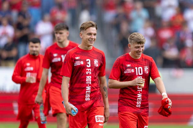 Regionalliga Northeast: FC Rot Weiß Erfurt vs. BFC Preussen Erfurt, August 29, 2026. Til Linus Schwarz (No. 3, FC Rot Weiß Erfurt) on the left and Marco Ferdinand Wolf (No. 10, FC Rot Weiß Erfurt) on the right. Regionalliga Northeast: FC Rot Weiß Erfurt vs. BFC Preussen, Steigerwaldstadion, Erfurt August 29, 2026 Copyright: xBEAUTIFULxSPORTS Duehringx