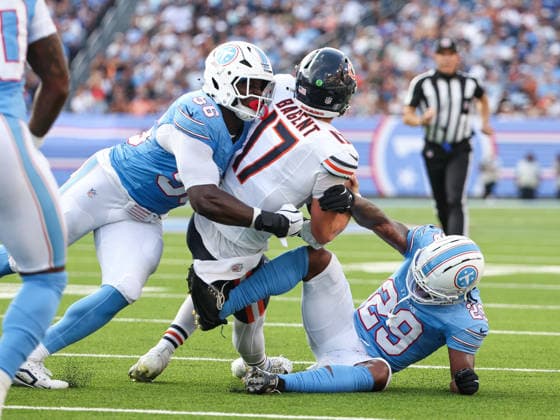 Aug 29, 2026; Nashville, Tennessee, USA; Chicago Bears quarterback Tyson Bagent (17) is tackled by Tennessee Titans defensive end Truman Jones (56) and Tennessee Titans cornerback Keydrain Calligan (29) during the NFL, American Football Herren, USA preseason game between the Chicago Bears and the Tennessee Titans at Nissan Stadium (Nashville). Mandatory Credit: -Cal Media NFL 2026: Bears Vs Titans AUG 29  - ZUMAc04_ 20260829_zma_c04_085 Copyright: xStephenxFurstx