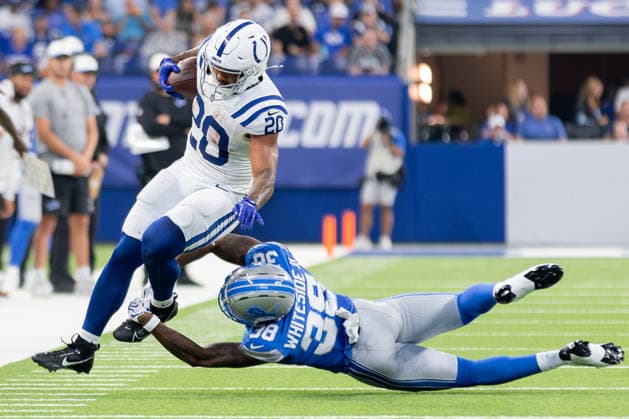 August 29, 2026, Indianapolis, Indiana, U.S: Indianapolis Colts running back Seth McGowan (20) is tackled by Detroit Lions defensive back Nick Whiteside (38) on a run during the preseason game between the Detroit Lions and the Indianapolis Colts at Lucas Oil Stadium, Indianapolis, Indiana. Indianapolis U.S - ZUMAs304 20260829_zaf_s304_057 Copyright: xScottxStuartx