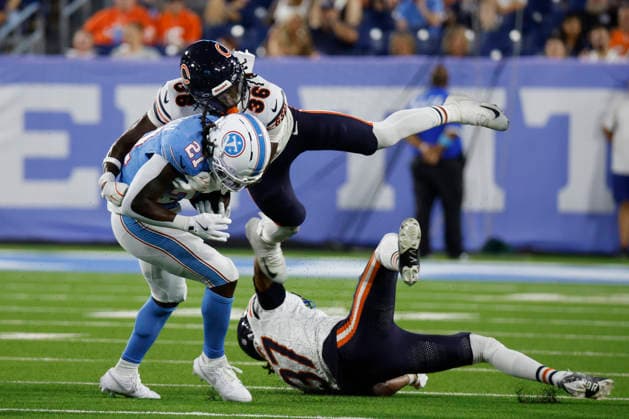 NASHVILLE, TN - AUGUST 29: Chicago Bears running back Salvon Ahmed (36) leaps to make a tackle on Tennessee Titans defensive back Micah Robinson (21) during a preseason game between the Tennessee Titans and Chicago Bears, August 29, 2026 at Nissan Stadium in Nashville, Tennessee. (Photo by Matthew Maxey Icon Sportswire) NFL, American Football Herren, USA AUG 29 Bears at Titans EDITORIAL USE ONLY Icon260829038
