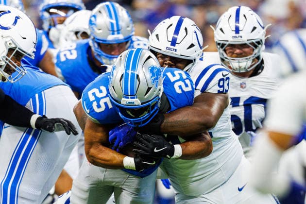 Aug 29, 2026; Indianapolis, Indiana, USA; Detroit Lions running back Jacob Saylors (25) carries the ball as Indianapolis Colts defensive lineman Tim Smith (93) makes the tackle during NFL, American Football Herren, USA preseason game action at Lucas Oil Stadium. Mandatory Credit: -Cal Media Indianapolis USA - ZUMAc04_ 20260829_zma_c04_275 Copyright: xJohnxMersitsx