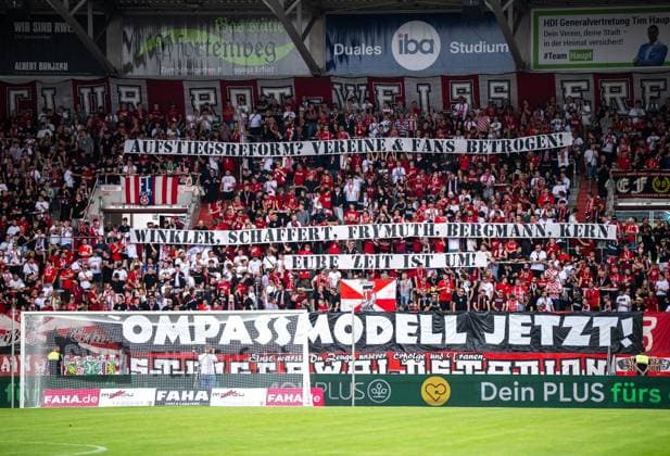 SOCCER REGIONAL LEAGUE NORTHEAST 2026–2027 SEASON, MATCHDAY 7: FC ROT WEISS ERFURT vs. BFC PREUSSEN ** FOR EDITORIAL PURPOSES ONLY ** EDITORIAL USE ONLY ** p August 29, 2026 Erfurt Soccer Regional League Northeast, Matchday 7, 2026–2027 Season, Steigerwaldstadion: FC Rot Weiss Erfurt vs. BFC Preussen. In the photo: a banner in the RWE fan section reading Promotion Reform: Clubs and Fans Betrayed. Winkler, Schaffert, Frymuth, Bermann, Kern—your time is up. Germany, Thuringia, Erfurt. Copyright SaschaxFromm Copyright: SaschaxFromm doc87dl96ryrlf9057iohg ,EDITORIAL USE ONLY Copyright: SaschaxFromm