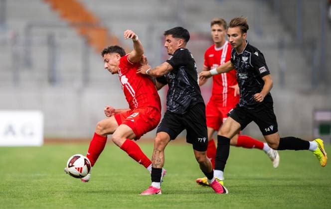 SOCCER REGIONAL LEAGUE NORTHEAST 2026–2027 SEASON, MATCHDAY 7: FC ROT WEISS ERFURT vs. BFC PREUSSEN ** FOR EDITORIAL PURPOSES ONLY ** EDITORIAL USE ONLY ** p August 29, 2026 Erfurt Soccer Regional League Northeast Matchday 7, 2026–2027 Season, Steigerwaldstadion: FC Rot-Weiss Erfurt vs. BFC Preussen. Pictured: Robbie Felßberg (18, Rot-Weiss Erfurt) in a tackle with Ben Meyer (77) BFC Preussen Germany Thuringia Erfurt Copyright SaschaxFromm Copyright: SaschaxFromm doc87dl88glww0e108rcxf ,EDITORIAL USE ONLY Copyright: SaschaxFromm