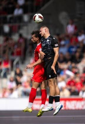 SOCCER REGIONAL LEAGUE NORTHEAST 2026–2027 SEASON, MATCHDAY 7: FC ROT WEISS ERFURT vs. BFC PREUSSEN ** FOR EDITORIAL PURPOSES ONLY ** ** EDITORIAL USE ONLY ** p August 29, 2026 Erfurt Soccer Northeast Regional League Matchday 7, 2026–2027 Season, Steigerwaldstadion: FC Rot Weiss Erfurt vs. BFC Preussen. Pictured: Romarjo Hajrulla 9 of FC Rot Weiss Erfurt in a tackle with Adrian Kireski 4 BFC Preussen, Germany, Thuringia, Erfurt. Copyright SaschaxFromm Copyright: SaschaxFromm doc87dl5ikbz9ee97e8oct ,EDITORIAL USE ONLY Copyright: SaschaxFromm