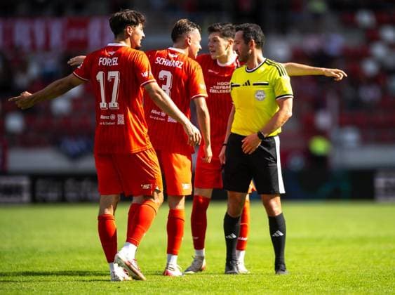 SOCCER REGIONAL LEAGUE NORTHEAST 2026–2027 SEASON, MATCHDAY 7: FC ROT WEISS ERFURT vs. BFC PREUSSEN ** FOR EDITORIAL PURPOSES ONLY ** EDITORIAL USE ONLY ** August 29, 2026 Erfurt Soccer Regional League Northeast Matchday 7, 2026–2027 Season Steigerwaldstadion FC Rot-Weiss Erfurt vs. BFC Preussen in the photo: Til Linus Schwarz (3, FC Rot-Weiss Erfurt) and Niclas Walther (22, FC Rot-Weiss Erfurt discuss with referee Patrick Kluge Germany Thuringia Erfurt Copyright SaschaxFromm Copyright: SaschaxFromm doc87dkzx72k411bdu6coct ,EDITORIAL USE ONLY Copyright: SaschaxFromm