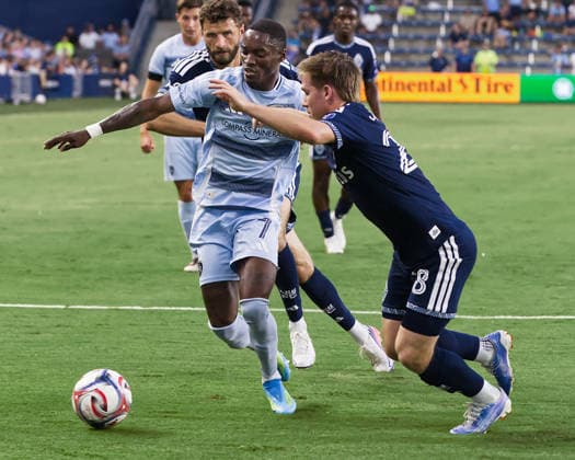 August 29, 2026, Kansas City, Kansas, USA: Sporting KC forward CAPITA CAPEMBA 7 (center) is on the offense against Vancouver Whitecaps FC defender TATE JOHNSON 28 (foreground-l) and Vancouver Whitecaps FC forward THOMAS MULLER 13 (behind) during the first half of the game at Sporting Park in Kansas City, KS, on August 29, 2026. Kansas City USA - ZUMAh139 20260829_zap_h139_003 Copyright: xSerenaxS.Y.xHsux