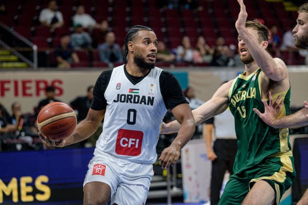 August 30, 2026, Manila, Manila, Philippines: Abdullah OLAJUWON avoids a block by Australia s Nick KAY.FIBA World Cup Basketball Asian Qualifiers The Australian Boomers vs Jordan in the Group E match of the FIBA Basketball World Cup Qualifiers at the Mall of Asia Arena, Manila, Philippines on Sunday 30 August 2026..The top 2 teams with qualify for the FIBA Basketball World Cup, Qatar in 2027. Manila Philippines - ZUMAr144 20260830_zap_r144_015 Copyright: xJaynexRussellx