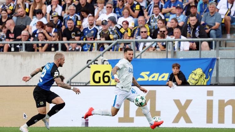August 30, 2026, xrekx, Soccer 3rd Division, 1. FC Saarbrücken vs. Hansa Rostock: Philip Fahrner (1. FC Saarbrücken), Leon Dajaku (Hansa Rostock), Saarbrücken