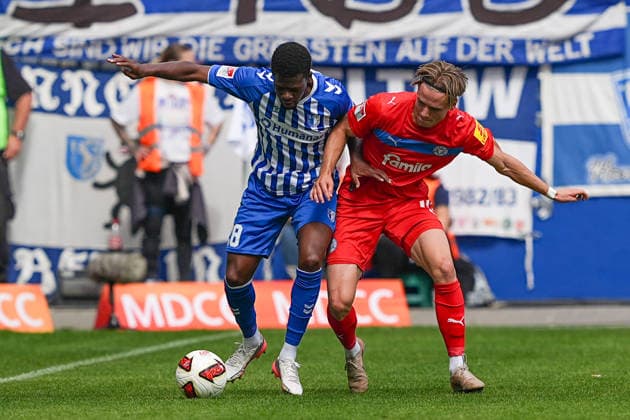 30.08.2026, xydrx, Fußball, 2. Fußball Bundesliga, 1.FC Magdeburg - Holstein Kiel, Saison 2026 2027, Avnet Arena: Pierre Nadjombe (1.FC Magdeburg, 28) im Zweikampf gegen Jonas Therkelsen (Holstein Kiel, 10) DFB regulations prohibit any use of photographs as image sequences and or quasi-video. *** August 30, 2026, xydrx, Soccer, 2. Bundesliga, 1. FC Magdeburg vs. Holstein Kiel, 2026–2027 season, Avnet Arena Pierre Nadjombe 1 FC Magdeburg, No. 28 in a tackle against Jonas Therkelsen of Holstein Kiel, No. 10 DFB regulations prohibit any use of photographs as image sequences and or quasi-video Copyright: HMBxMedia YannisxDreimann