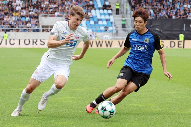 August 30, 2026, xrekx, Soccer 3rd Division, 1. FC Saarbrücken vs. Hansa Rostock v l Florian Bohnert, FC Hansa Rostock, Seung Joon Lee, 1. FC Saarbrücken, Tackle, Action, Battle for the Ball, Saarbrücken