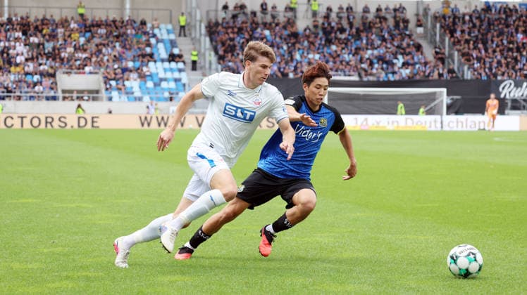August 30, 2026, xrekx, Soccer 3rd Division, 1. FC Saarbrücken vs. Hansa Rostock v l Florian Bohnert, FC Hansa Rostock, Seung Joon Lee, 1. FC Saarbrücken, tackle, action, battle for the ball, Saarbrücken