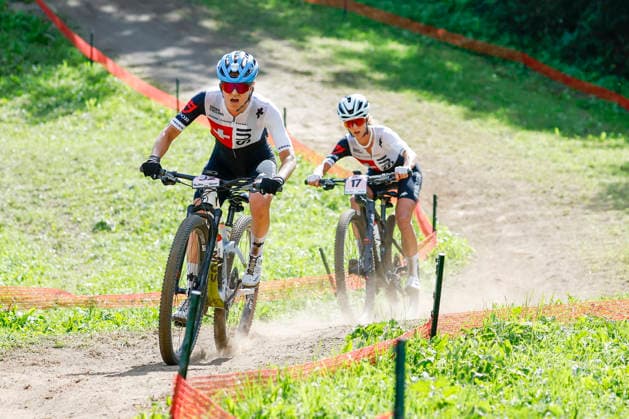 TRENTO, ITALY, AUGUST 30: Ginia Caluori of Switzerland (L) is chased by Jolanda Neff of Switzerland (R) during the UCI Mountain Bike World Championships—Women s Elite Cross-Country World Championships—at Val di Sole on August 30, 2026, in Trento, Italy. Trento, Val di Sole, Trento, Italy Copyright: xJustPictures.ch FrancescoxMinghettix jp-en-EuSpIm-JP6_FRM_UCIWC_GRLXCO_30Aug_000225