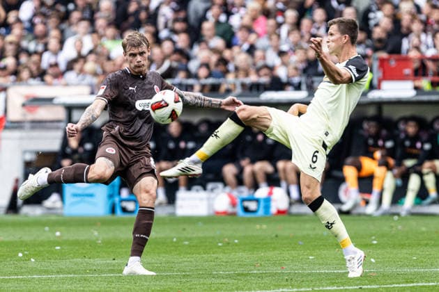 2. Fußball Bundesliga: FC St. Pauli - 1. FC Kaiserslautern; 30.08.2026 Eric Smith (FC St. Pauli, 8), Fabian Kunze (1. FC Kaiserslautern, 6) 2. Fußball Bundesliga 3.Spieltag: FC St. Pauli - 1. FC Kaiserslautern; Millerntor-Stadion, Hamburg, St. Pauli; 30.08.2026 DFL regulations prohibit any use of photographs as image sequences and or quasi video. *** 2 German Bundesliga FC St. Pauli 1 FC Kaiserslautern August 30, 2026 Eric Smith FC St. Pauli, 8, Fabian Kunze 1 FC Kaiserslautern, 6 2 German Bundesliga Matchday 3 FC St. Pauli 1 FC Kaiserslautern Millerntor Stadium, Hamburg, St. Pauli August 30, 2026 DFL regulations prohibit any use of photographs as image sequences and or quasi-video Copyright: xBEAUTIFULxSPORTS Buriakovx