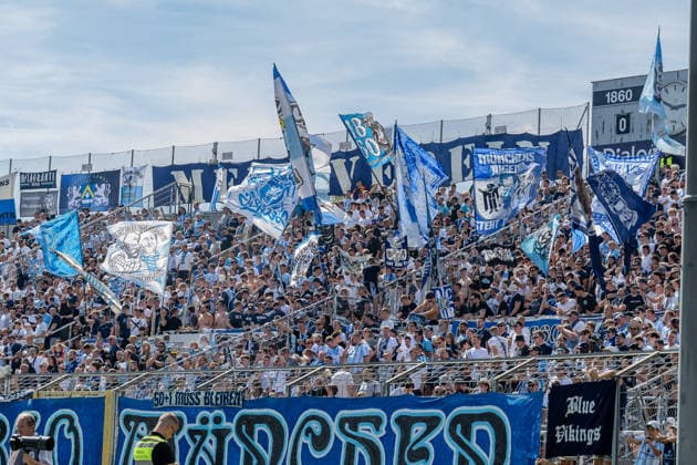 The Löwen fans in the Westkurve await the kickoff of the match between GER, TSV 1860 Munich, and TSV Landsberg 1882—soccer, Bavarian Regional League, Matchday 6, 2026–2027 season, August 30, 2026 DFL DFB REGULATIONS PROHIBIT ANY USE OF PHOTOGRAPHS AS IMAGE SEQUENCES AND OR QUASI-VIDEO Photo: HMB Media, Heike Feiner Copyright: HMBxMedia HeikexFeiner