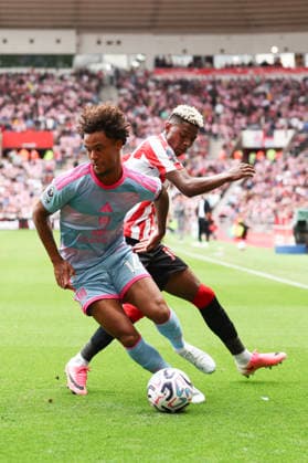 Sunderland v Fulham, Premier League Oscar Bobb of Fulham and Nilson Angulo of Sunderland during the Premier League match between Sunderland and Fulham at the Stadium Of Light, Sunderland, UK on 30 August 2026. Sunderland Stadium Of Light Tyne and Wear UK Editorial use only DataCo restrictions apply See www.football-dataco.com , Copyright: xRyanxBrownex PSI-24780-0038