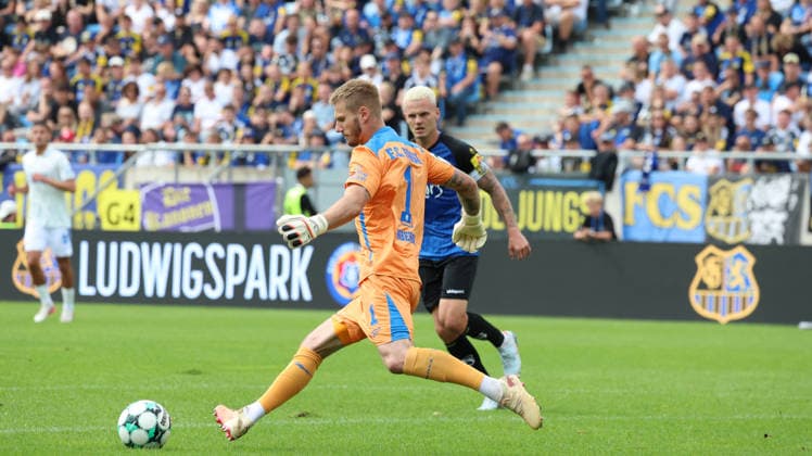 August 30, 2026, xrekx, Soccer 3rd Division, 1. FC Saarbrücken vs. Hansa Rostock, l Luca Unbehaun, FC Hansa Rostock, Florian Pick, 1. FC Saarbrücken, Saarbrücken