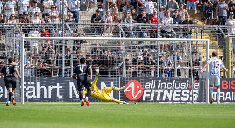 Michael Eberwein of TSV 1860 Munich, No. 13, converts a penalty kick into a goal, making the score 1–0 against goalkeeper Leopold Leimeister of TSV 1882 Landsberg, 01 GER, TSV 1860 Munich vs. TSV Landsberg 1882, Soccer, Bavarian Regional League, Matchday 6, 2026–2027 Season, August 30, 2026 DFL and DFB regulations prohibit any use of photographs as image sequences and or quasi-video. Photo: HMB Media, Heike Feiner Copyright: HMBxMedia HeikexFeiner