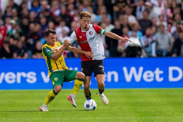 ROTTERDAM , 30-08-2026 , Stadium feijenoord De Kuip , season 2025 2026 , Dutch Eredivisie football , match between Feyenoord and ADO Den Haag , picture shows ADO player Daryl van Mieghem and Feyenoord player Luciano Valente Feyenoord - ADO  x206245810x Copyright: