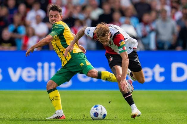 ROTTERDAM , 30-08-2026 , Stadium feijenoord De Kuip , season 2025 2026 , Dutch Eredivisie football , match between Feyenoord and ADO Den Haag , picture shows ADO player Daryl van Mieghem and Feyenoord player Luciano Valente Feyenoord - ADO  x206245811x Copyright: