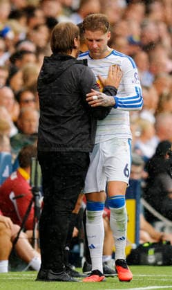 Leeds, England, 30th August 2026. Injured Joe Rodon of Leeds United is consoled by Daniel Farke manager of Leeds United during the Leeds United vs Brentford Premier League match at Elland Road, Leeds. Picture credit should read: James Baylis Sportimage EDITORIAL USE ONLY. No use with unauthorised audio, video, data, fixture lists, club league logos or live services. Online in-match use limited to 120 images, no video emulation. No use in betting, games or single club league player publications. SPI_016_JB_Leeds_Brentford SPI-4950-0015