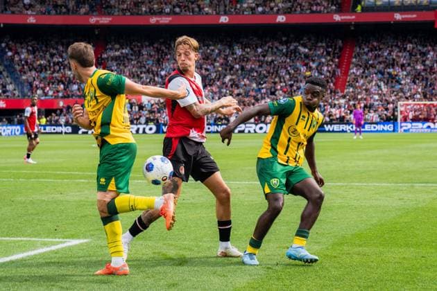 ROTTERDAM , 30-08-2026 , Stadium feijenoord De Kuip , season 2025 2026 , Dutch Eredivisie football , match between Feyenoord and ADO Den Haag , picture shows Feyenoord player Luciano Valente and ADO Player Sekou Sylla Feyenoord - ADO  x206245883x Copyright: