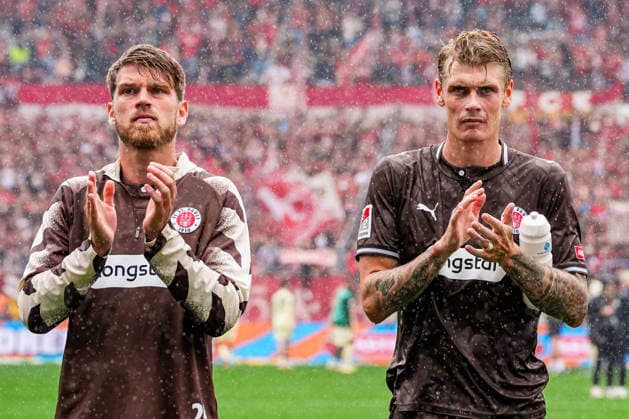 Germany Soccer 2. Bundesliga 2026–27, Matchday 3: FC St. Pauli vs. 1. FC Kaiserslautern at Millerntor Stadium, Hamburg, St. Pauli. After a loss in front of the fan section: Eric Smith (FC St. Pauli), 8; Marcus Mathisen (FC St. Pauli), 6 Copyright: xStefanxTrochax
