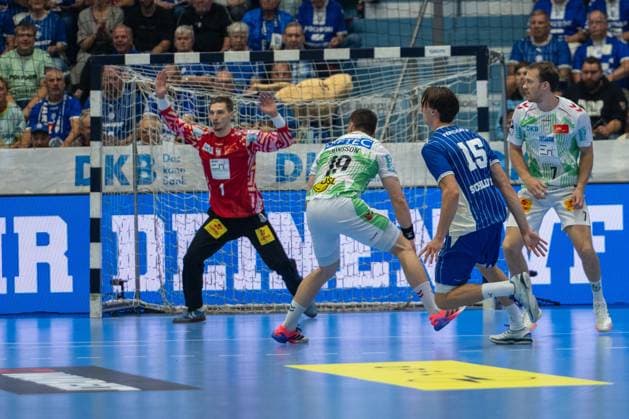 Dominik Kuzmanovic, goalkeeper, SC Magdeburg 1, Elvar Orn Jonsson, backcourt, SC Magdeburg 19, Miro Schluroff, backcourt, VfL Gummersbach 15, VfL Gummersbach vs. SC Magdeburg, Opel Handball Bundesliga, Men, Matchday 1, August 30, 2026, Gummersbach, North Rhine-Westphalia, Germany Copyright: xkolbert-press MartinxWdziecznyx