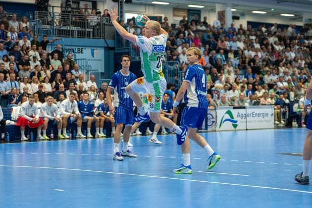 Magnus Saugstrup, pivot, SC Magdeburg; Ellidi Snaer Vidarsson, pivot, VfL Gummersbach 4; VfL Gummersbach vs. SC Magdeburg, Opel Handball Bundesliga, Men s Division; Matchday 1, August 30, 2026, Gummersbach, North Rhine-Westphalia, Germany Copyright: xkolbert-press MartinxWdziecznyx