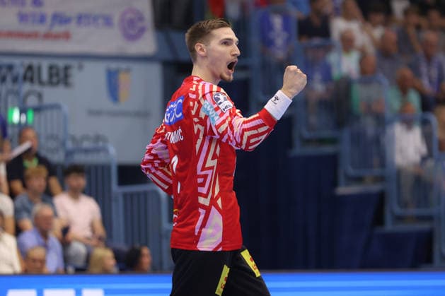August 30, 2026, xtgx, Opel HBL Handball, VfL Gummersbach vs. SC Magdeburg emspor, from left: Dominik Kuzmanovic (Magdeburg), 1: Celebrating a saved shot, blocked, saved, Gummersbach goalkeeper