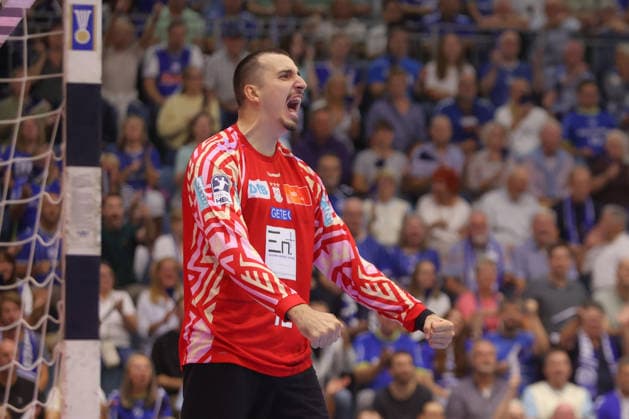 August 30, 2026, xtgx, Opel HBL Handball, VfL Gummersbach vs. SC Magdeburg emspor, from left: Matej Mandic (Magdeburg), 12 celebrating a saved shot, blocked, saved, Gummersbach goalkeeper