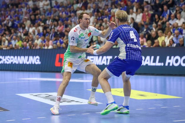 August 30, 2026, xgox, Handball Opel HBL VfL Gummersbach vs. SC Magdeburg, from left: Felix Claar (Magdeburg), 7; Ellidi Snaer Vidarsson (Gummersbach), 4; duel, battle, tackle, Gummersbach