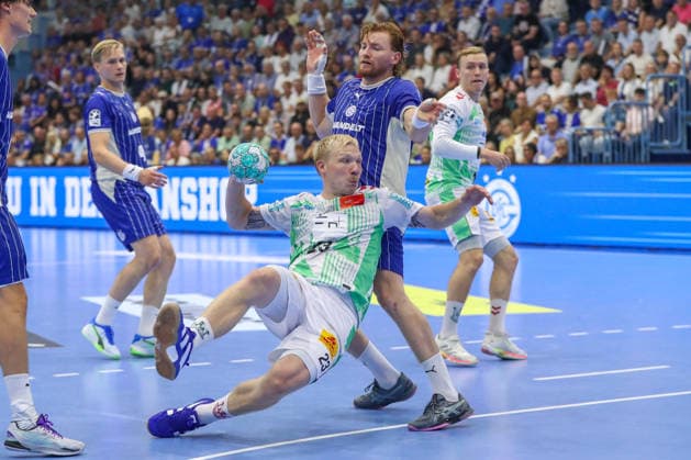 August 30, 2026, xgox, Handball Opel HBL VfL Gummersbach vs. SC Magdeburg, from left: Magnus Saugstrup (Magdeburg), 23, takes a shot, goal scorer, scores a goal, goal, scores the goal against Gummersbach