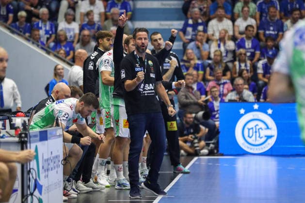 August 30, 2026, xgox, Handball, Opel HBL, VfL Gummersbach vs. SC Magdeburg, emspor, from left: Bennet Wiegert (Magdeburg), coach celebrating, goal celebration, celebrating the goal, Gummersbach