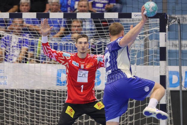 August 30, 2026, xtgx, Opel HBL Handball, VfL Gummersbach vs. SC Magdeburg, from left: Dominik Kuzmanovic (Magdeburg), 1 save, blocks the ball, catches the ball, stops Gummersbach