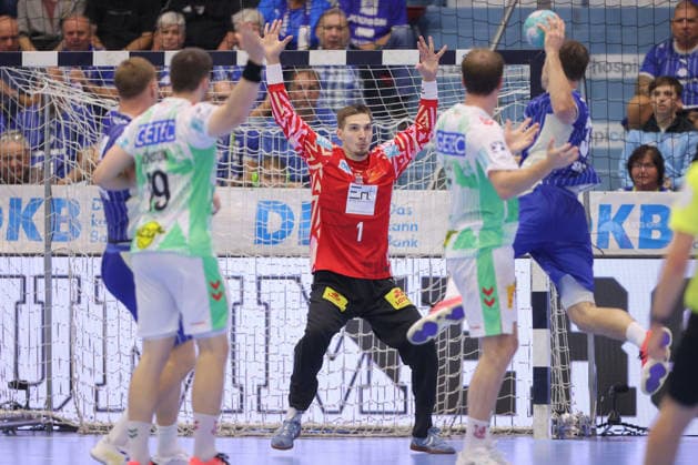 August 30, 2026, xtgx, Opel HBL Handball, VfL Gummersbach vs. SC Magdeburg, from left: Dominik Kuzmanovic (Magdeburg), 1 save, blocks the ball, catches the ball, stops Gummersbach