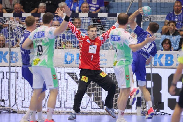 August 30, 2026, xtgx, Opel HBL Handball, VfL Gummersbach vs. SC Magdeburg, from left: Dominik Kuzmanovic (Magdeburg), 1 save, blocks the ball, catches the ball, stops Gummersbach